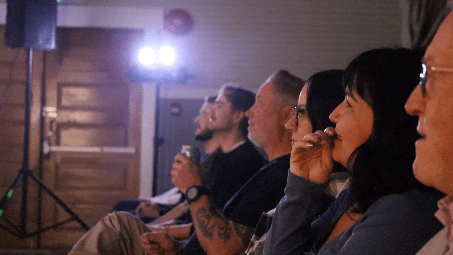 The audience at a Mo Filter Comedy night, mid laugh